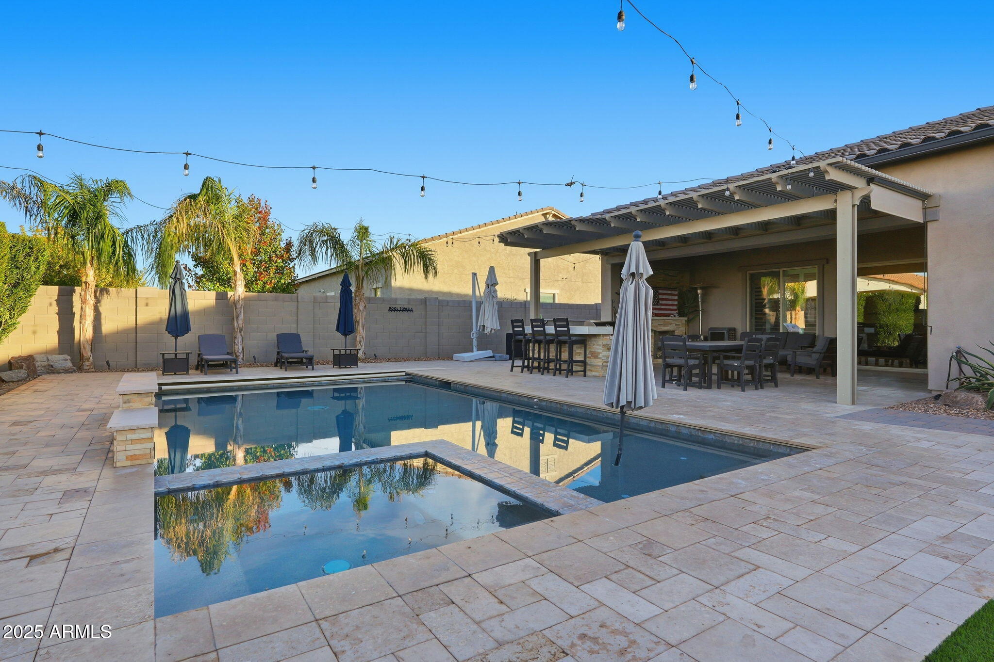 22940 East Camacho Road Queen Creek, AZ 85142 - Photo 58 of 68 a view of a swimming pool with chairs