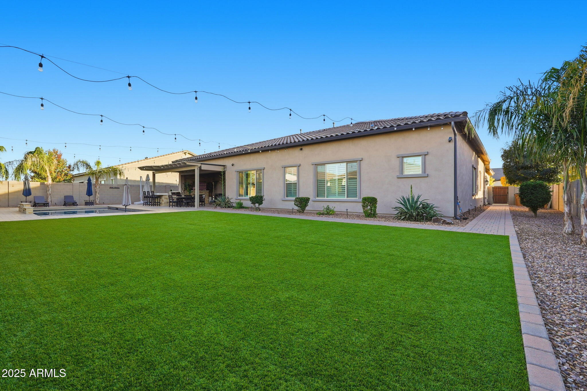 22940 East Camacho Road Queen Creek, AZ 85142 - Photo 60 of 68 a front view of house with yard and green space