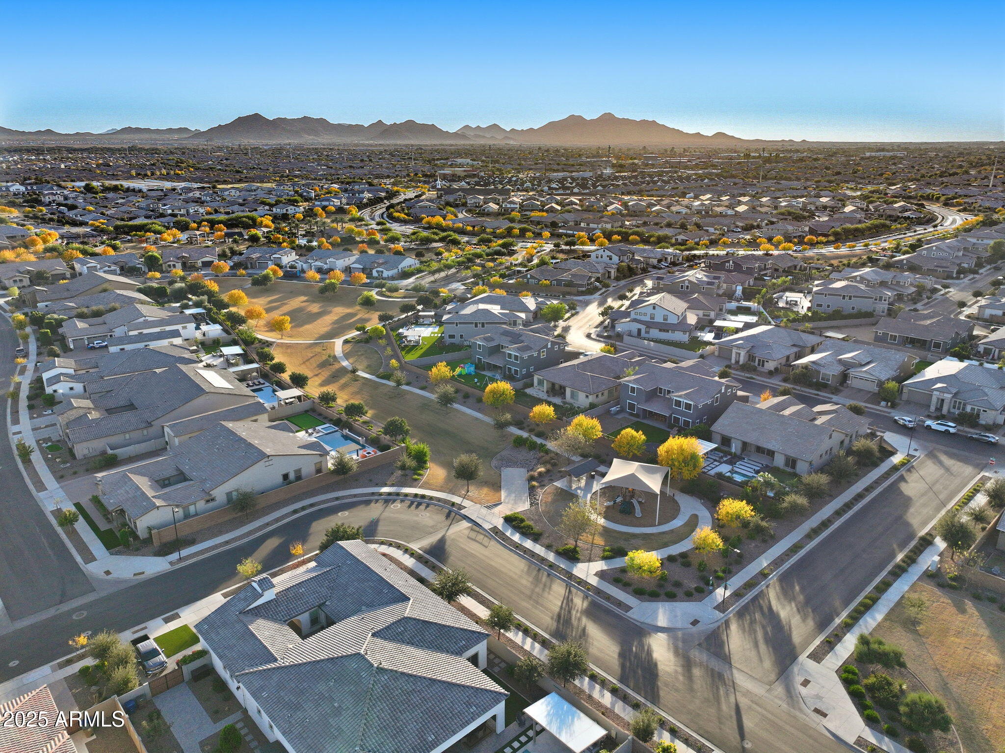 22940 East Camacho Road Queen Creek, AZ 85142 - Photo 66 of 68 an aerial view of residential houses with outdoor space