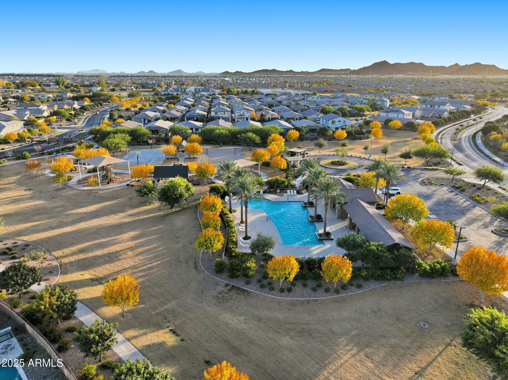 22940 East Camacho Road Queen Creek, AZ 85142 - Photo 68 of 68 an aerial view of residential houses with outdoor space