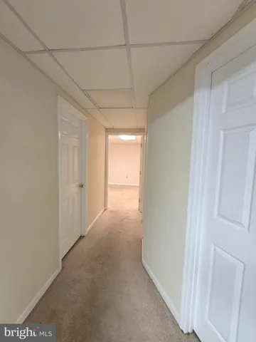a view of a room with a hallway