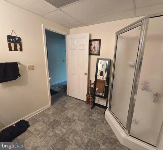 a view of a hallway with front door