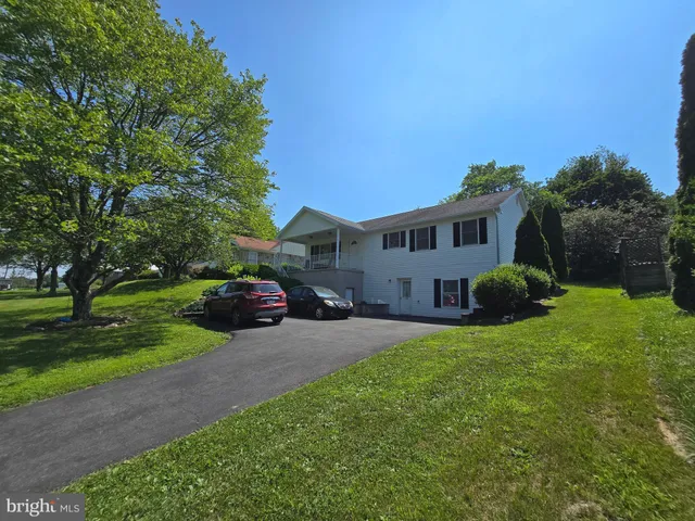 a house view with a garden space