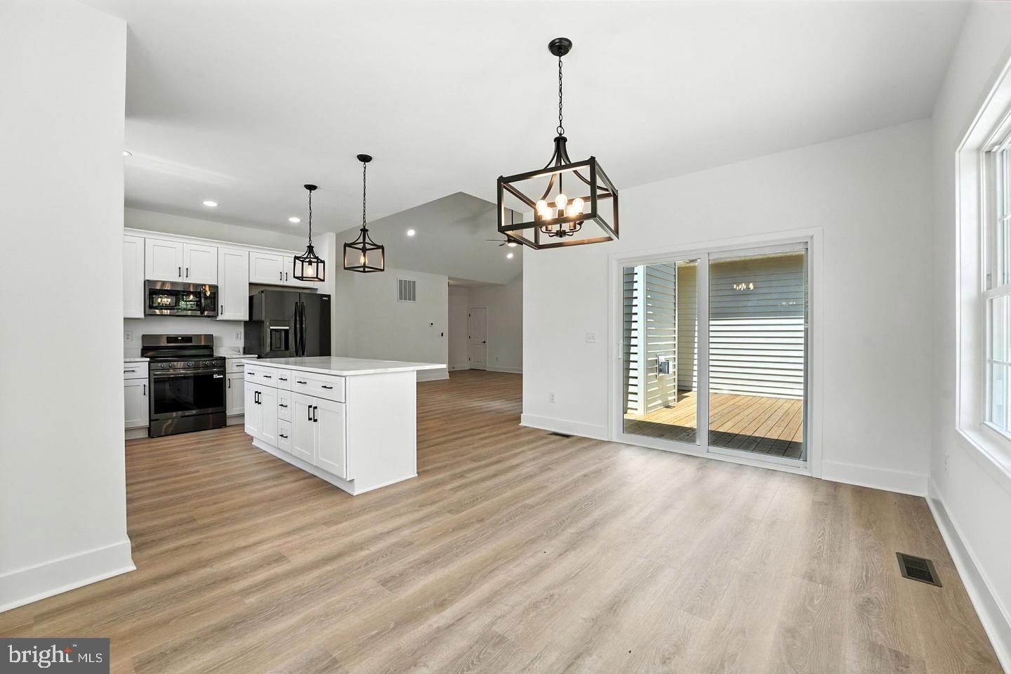 10704 Rixeyville Road Culpeper, VA 22701 - Photo 17 of 35 a view of a kitchen with stainless steel appliances