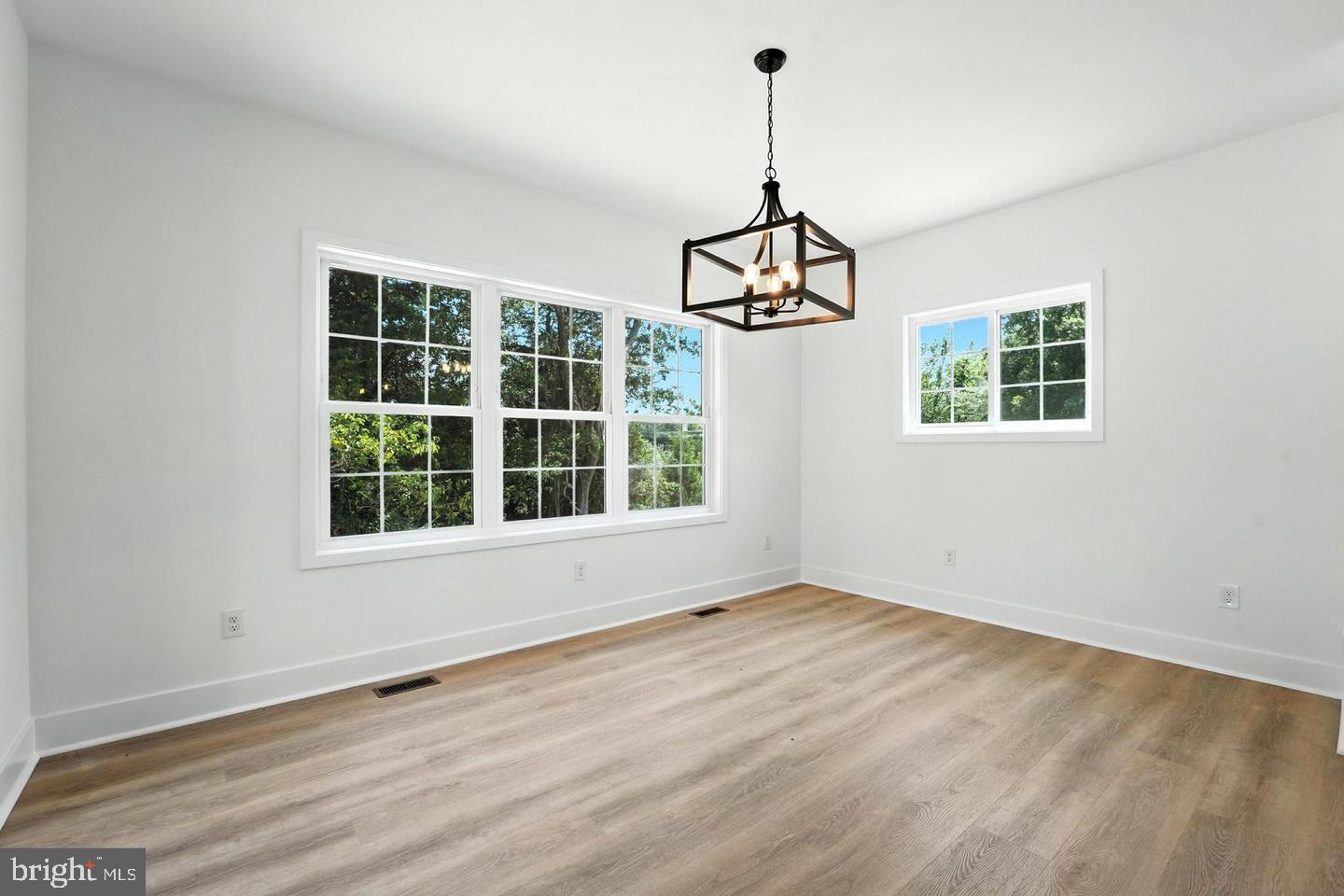 10704 Rixeyville Road Culpeper, VA 22701 - Photo 18 of 35 a view of an empty room with windows