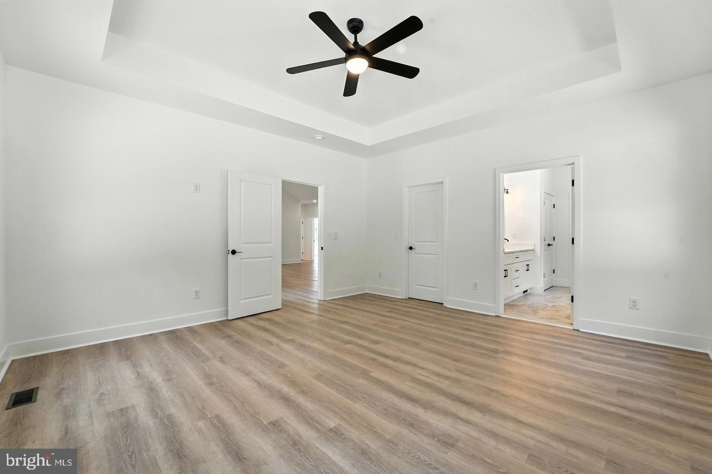 10704 Rixeyville Road Culpeper, VA 22701 - Photo 22 of 35 an empty room with fan and a ceiling fan