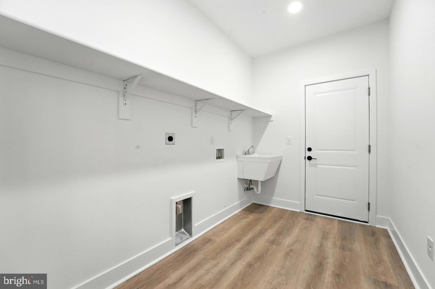 10704 Rixeyville Road Culpeper, VA 22701 - Photo 33 of 35 a view of storage and utility room with wooden floor