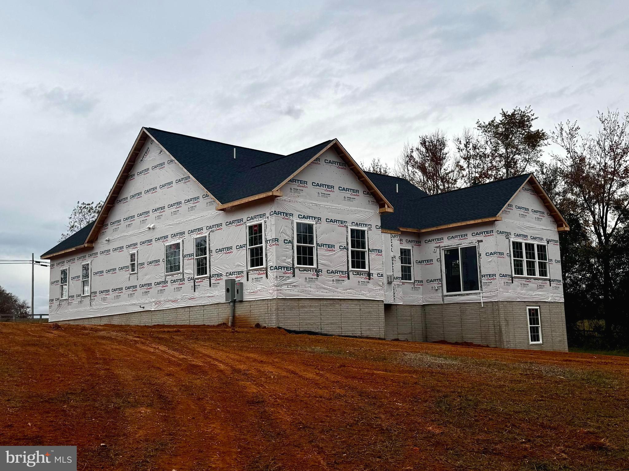10704 Rixeyville Road Culpeper, VA 22701 - Photo 9 of 35 a view of house with outdoor space and sitting area