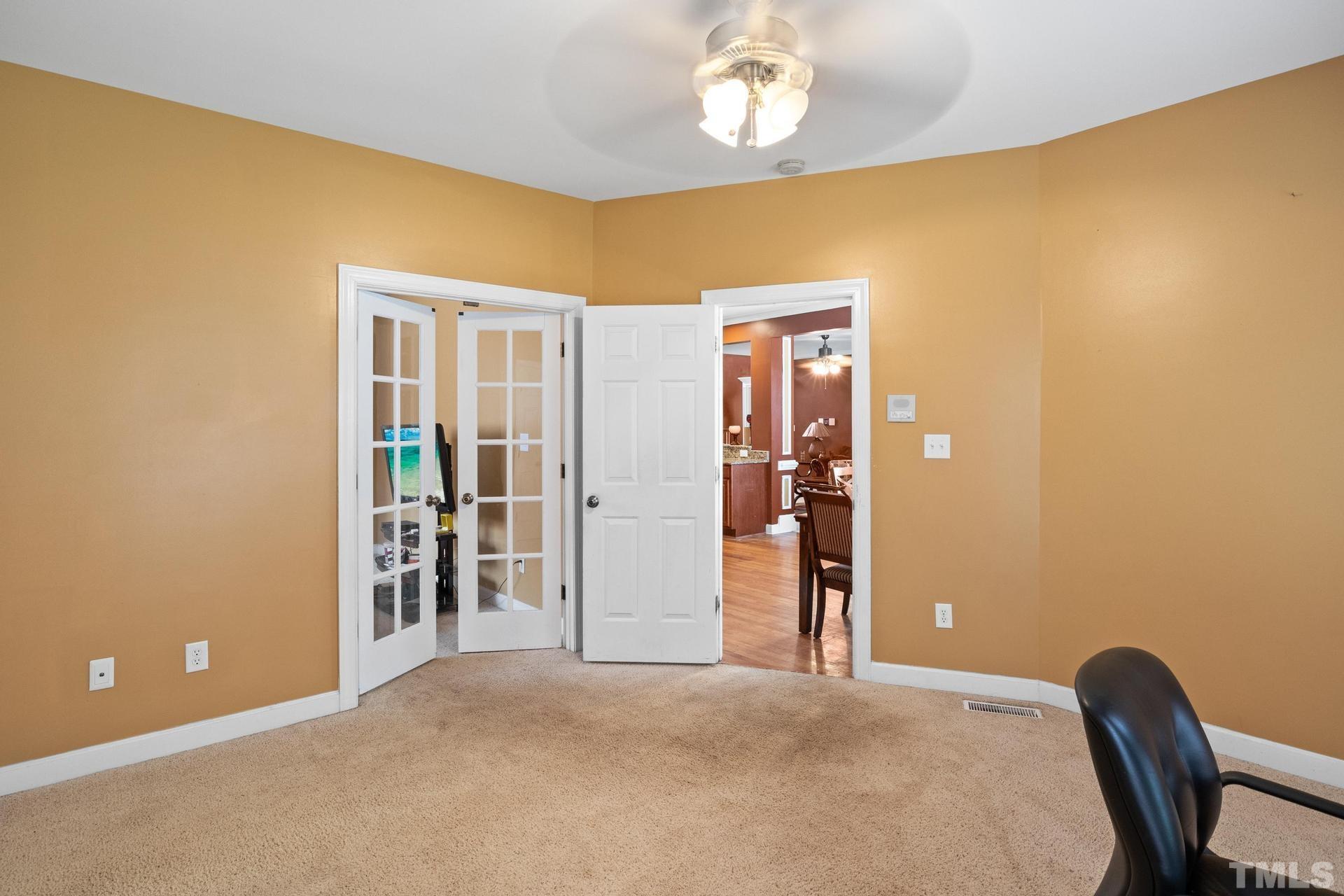 836 Crown Crossing Lane Raleigh, NC 27610 - Photo 21 of 31 a view of livingroom with workspace