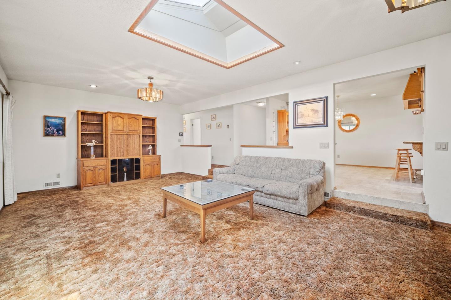 3060 Eddy Circle Marina, CA 93933 - Photo 12 of 35 a spacious bedroom with a bed and cabinets