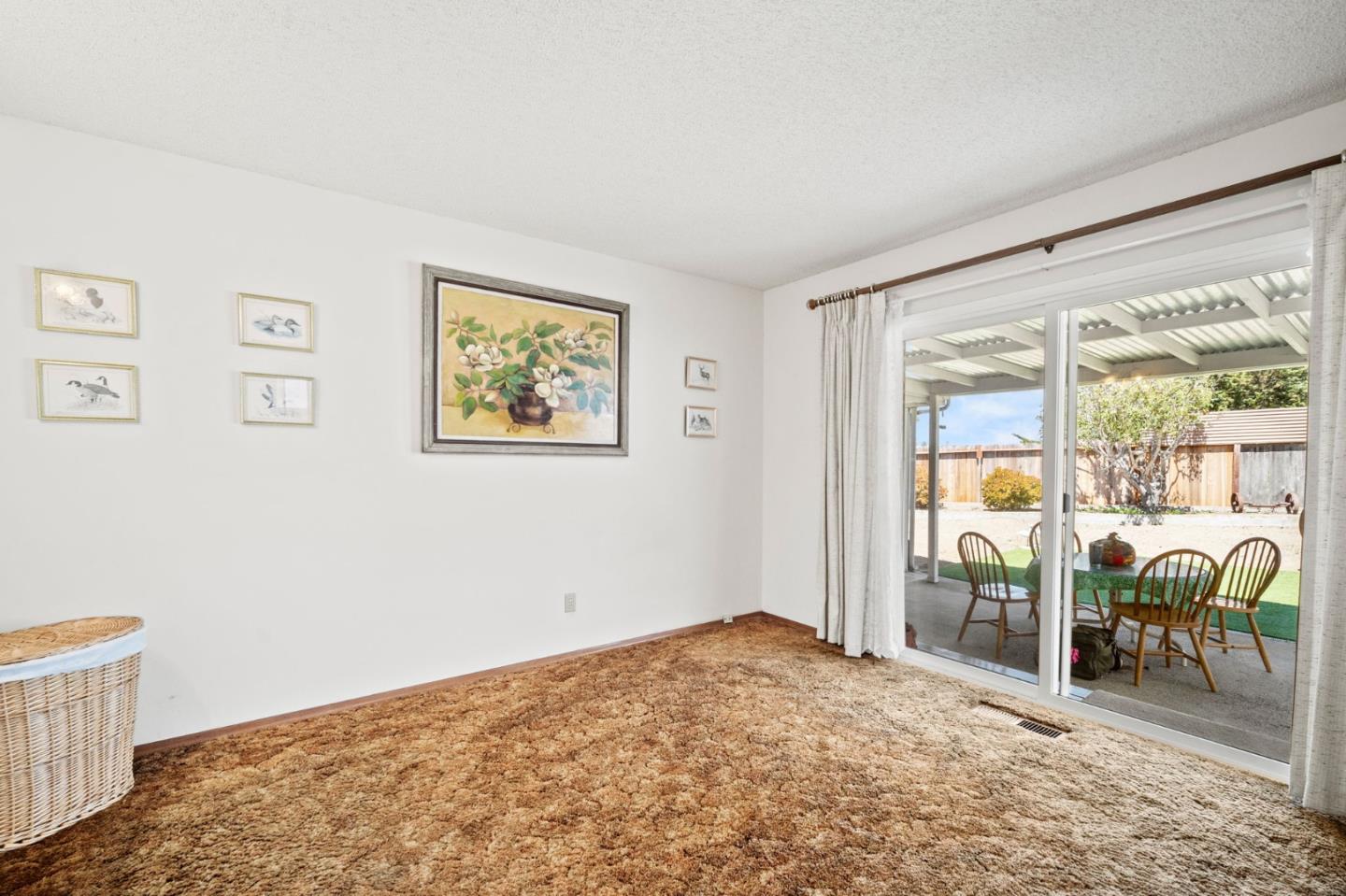 3060 Eddy Circle Marina, CA 93933 - Photo 14 of 35 a bedroom with a bed and a view of bedroom