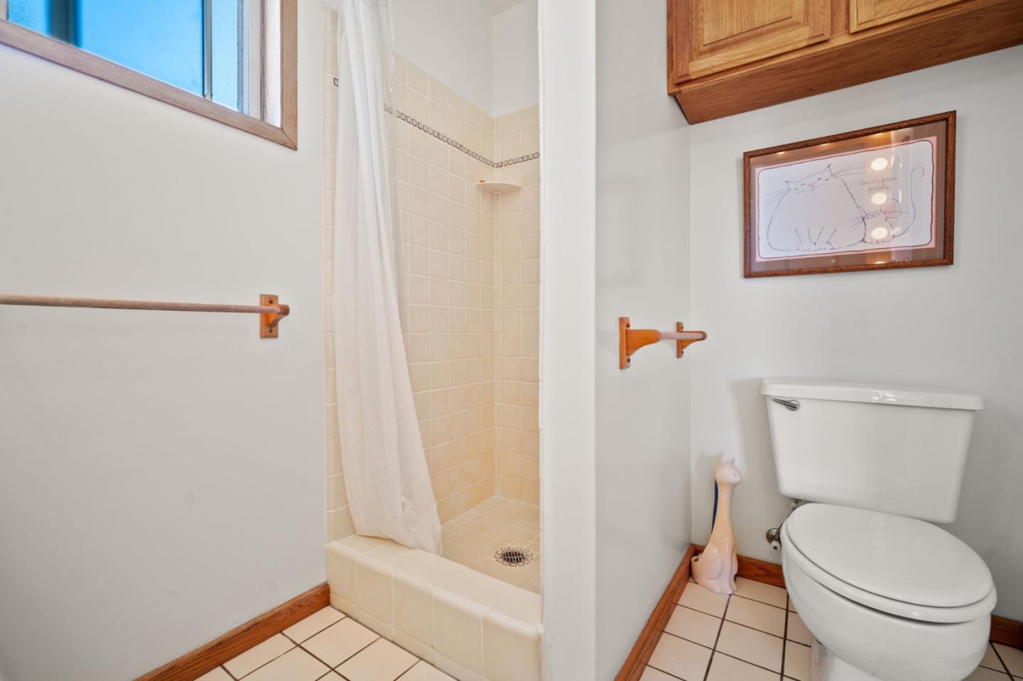 3060 Eddy Circle Marina, CA 93933 - Photo 17 of 35 a white toilet sitting next to a shower