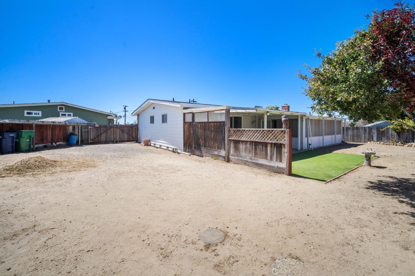 3060 Eddy Circle Marina, CA 93933 - Photo 26 of 35 a view of a house with a yard and a large tree