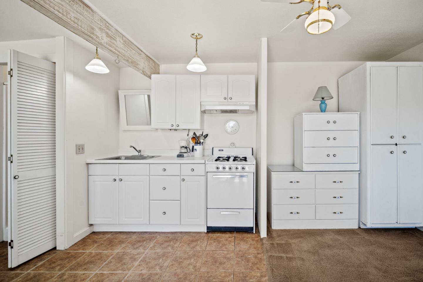 3060 Eddy Circle Marina, CA 93933 - Photo 29 of 35 a kitchen with cabinets appliances and a cabinets