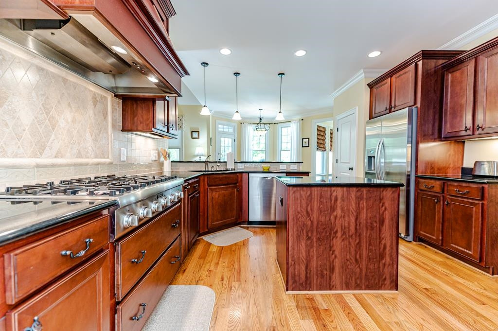 225 Henrys Ridge Road Pittsboro, NC 27312 - Photo 13 of 67 Stainless steel appliances. Thermador 6-burner gas cooktop.