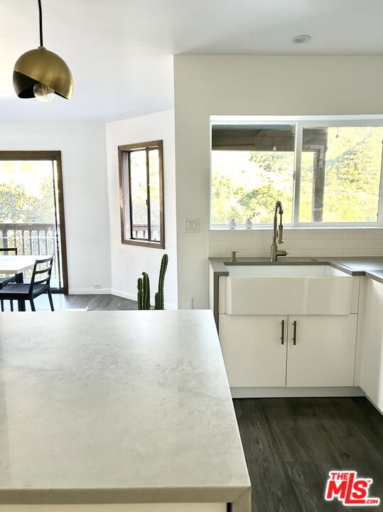 2690 Kennington Drive Glendale, CA 91206 - Photo 12 of 50 a kitchen with a sink and a large window