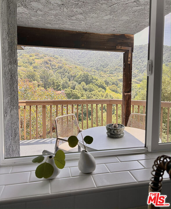 2690 Kennington Drive Glendale, CA 91206 - Photo 13 of 50 a view of living room with furniture and a window