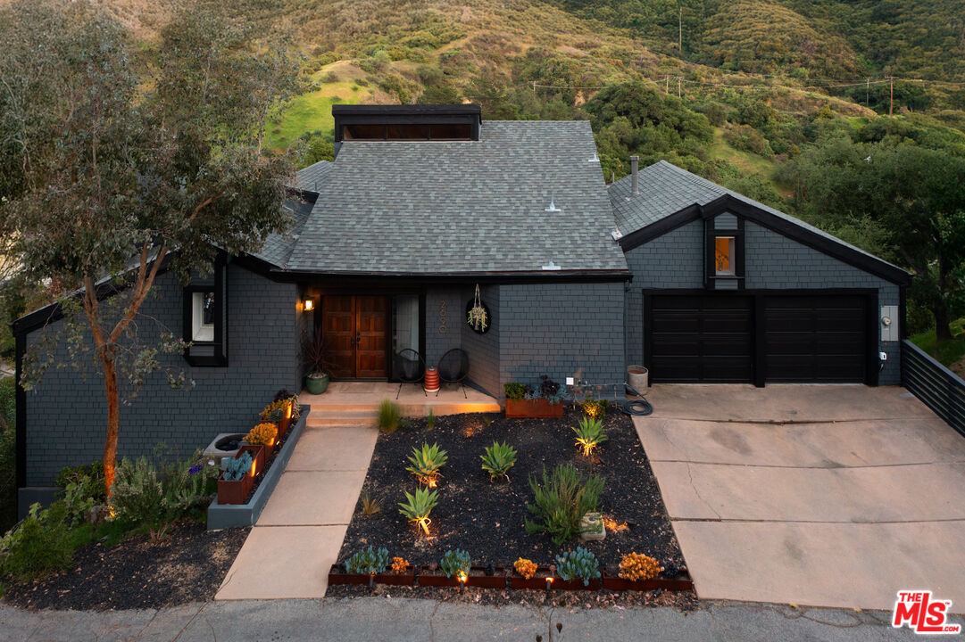 2690 Kennington Drive Glendale, CA 91206 - Photo 2 of 50 a front view of a house with yard