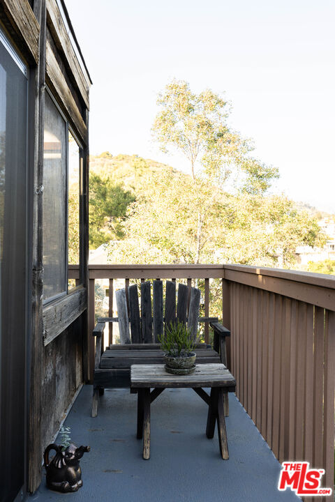 2690 Kennington Drive Glendale, CA 91206 - Photo 27 of 50 a bench sitting in front of a building