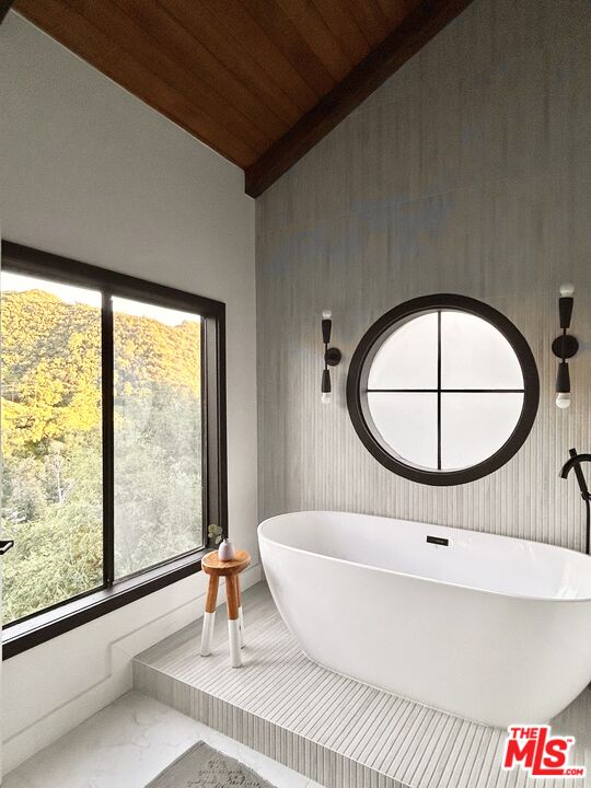 2690 Kennington Drive Glendale, CA 91206 - Photo 29 of 50 a living room with a large window and a table