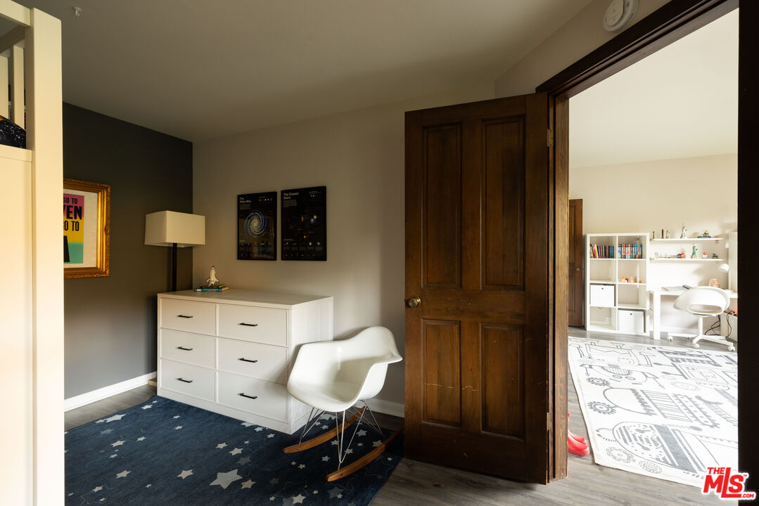 2690 Kennington Drive Glendale, CA 91206 - Photo 35 of 50 a living room with furniture and a flat screen tv
