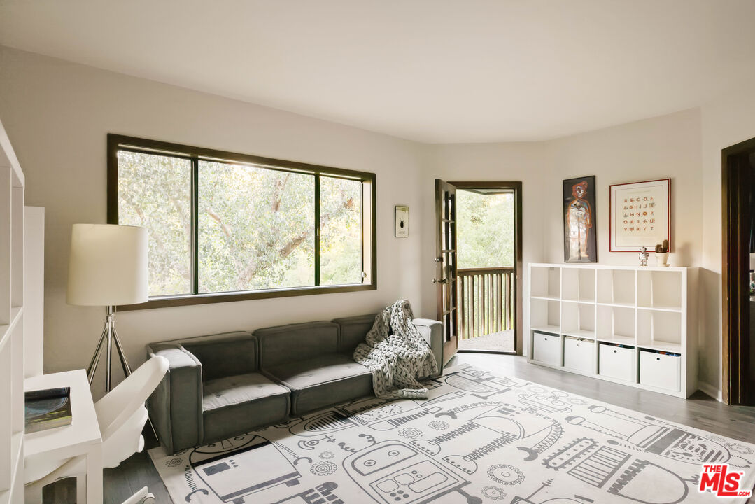 2690 Kennington Drive Glendale, CA 91206 - Photo 37 of 50 a bedroom with furniture and a window
