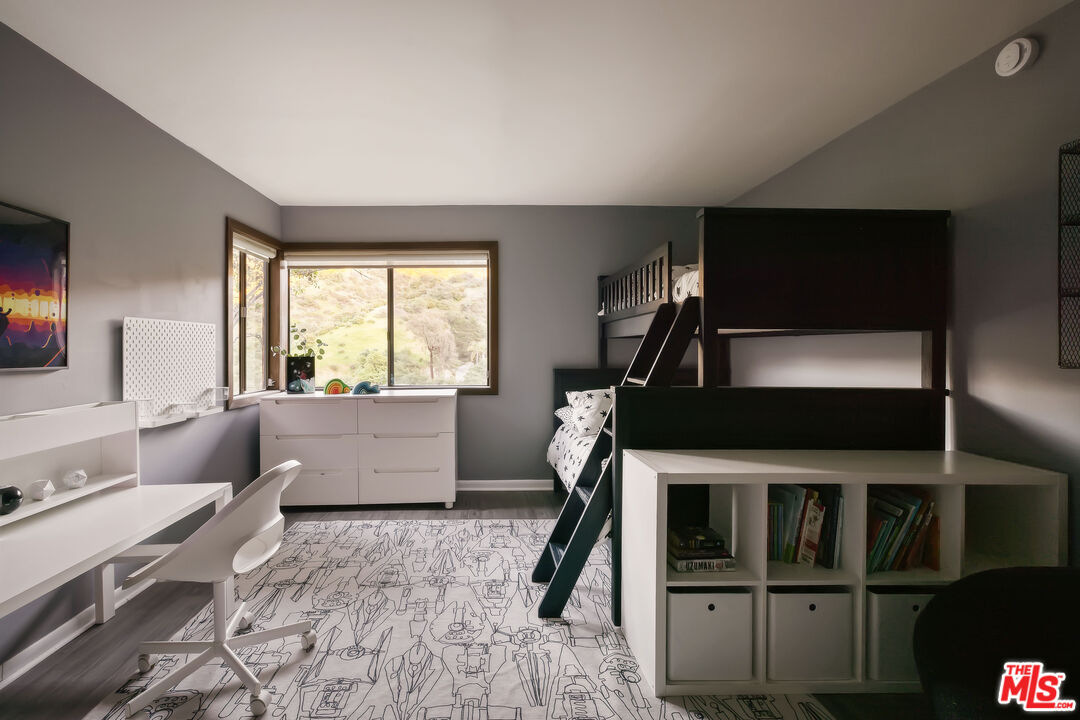 2690 Kennington Drive Glendale, CA 91206 - Photo 40 of 50 a living room with furniture and a flat screen tv