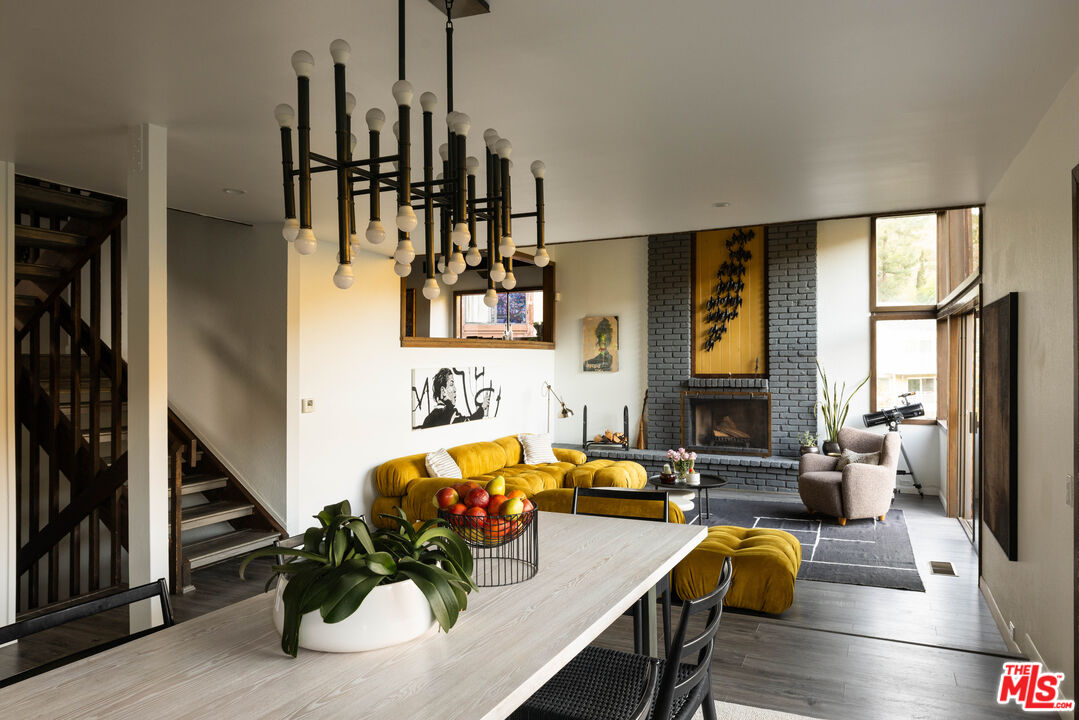 2690 Kennington Drive Glendale, CA 91206 - Photo 5 of 50 a living room with furniture flat screen tv and a large window