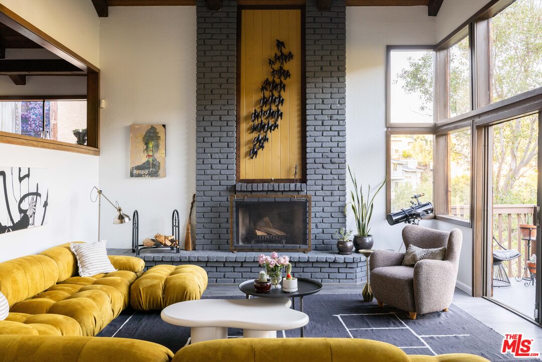 2690 Kennington Drive Glendale, CA 91206 - Photo 6 of 50 a living room with furniture and a large window