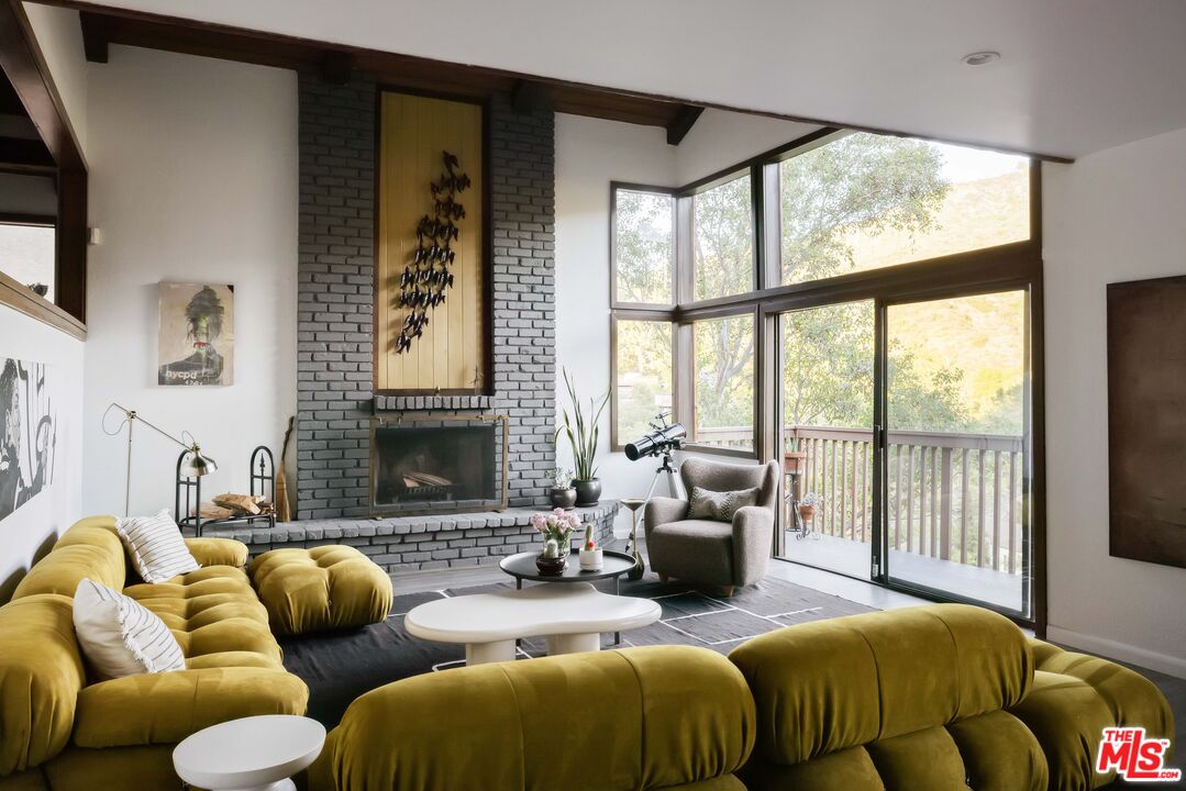 2690 Kennington Drive Glendale, CA 91206 - Photo 8 of 50 a bedroom with furniture and a large window