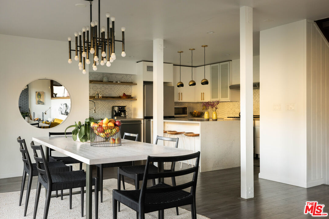 2690 Kennington Drive Glendale, CA 91206 - Photo 10 of 50 a kitchen with a dining table and chairs