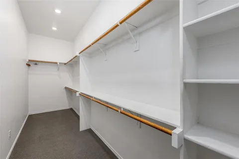 a view of a hallway with staircase