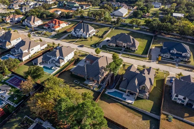 an aerial view of a city with lots of residential buildings