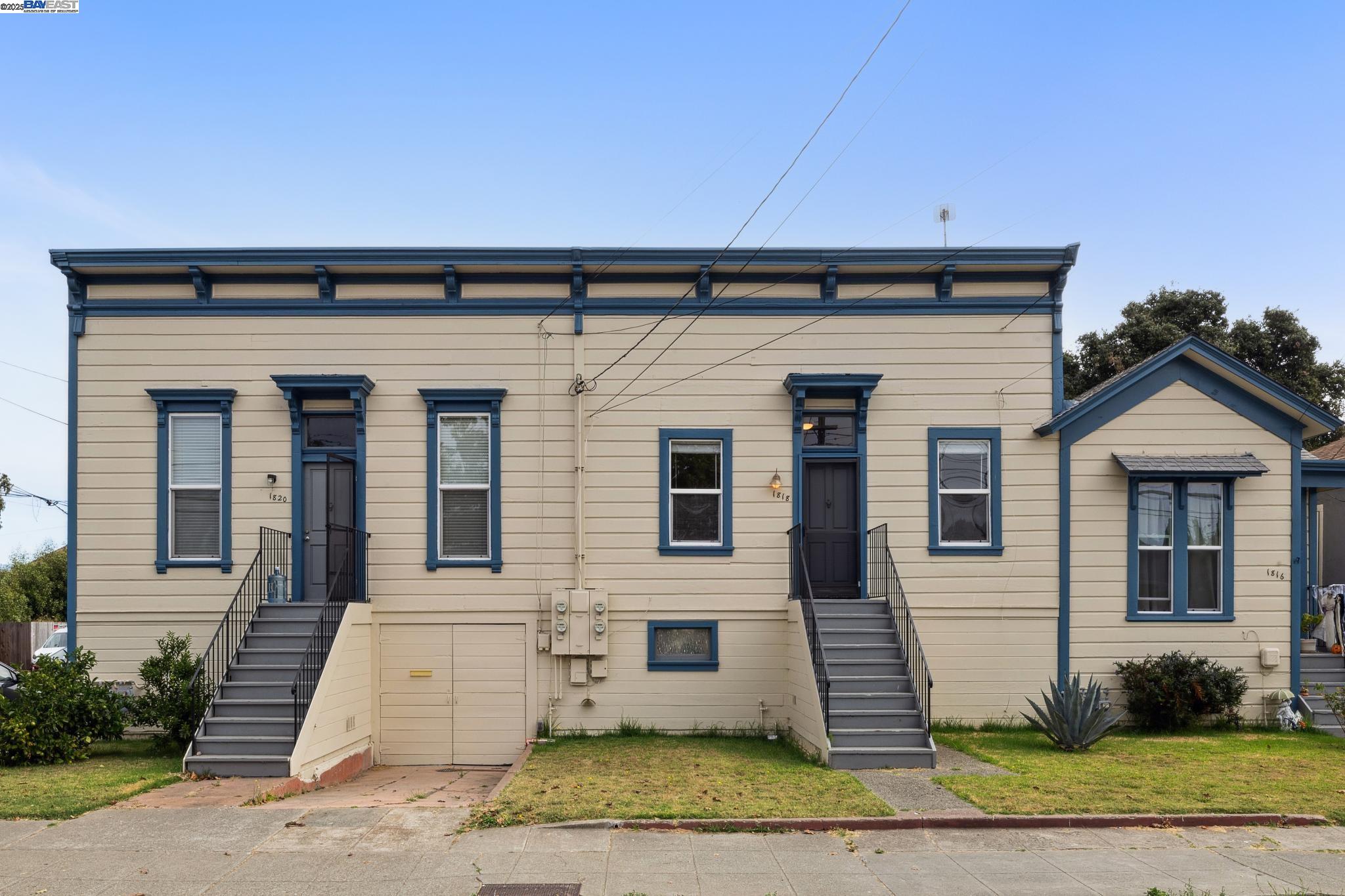 1820 3rd Street Alameda, CA 94501 - Photo 1 of 60 a front view of a house with a yard