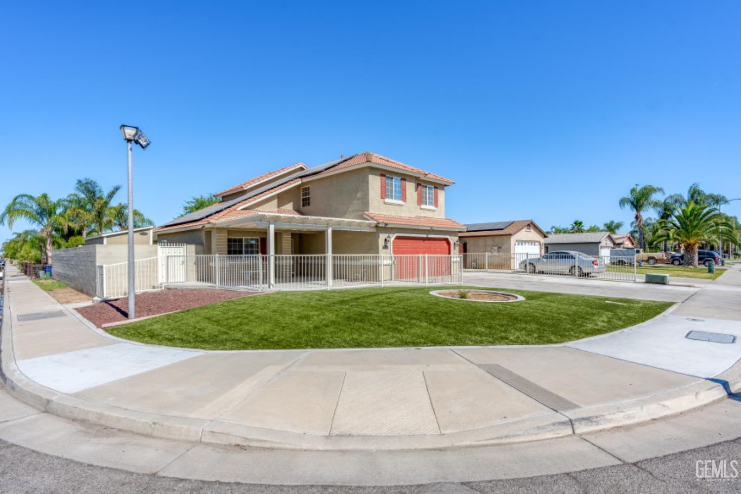 Restricted Address McFarland, CA 93250 - Photo 1 of 41 a front view of a house with a yard