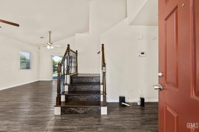 a view of entryway with wooden floor