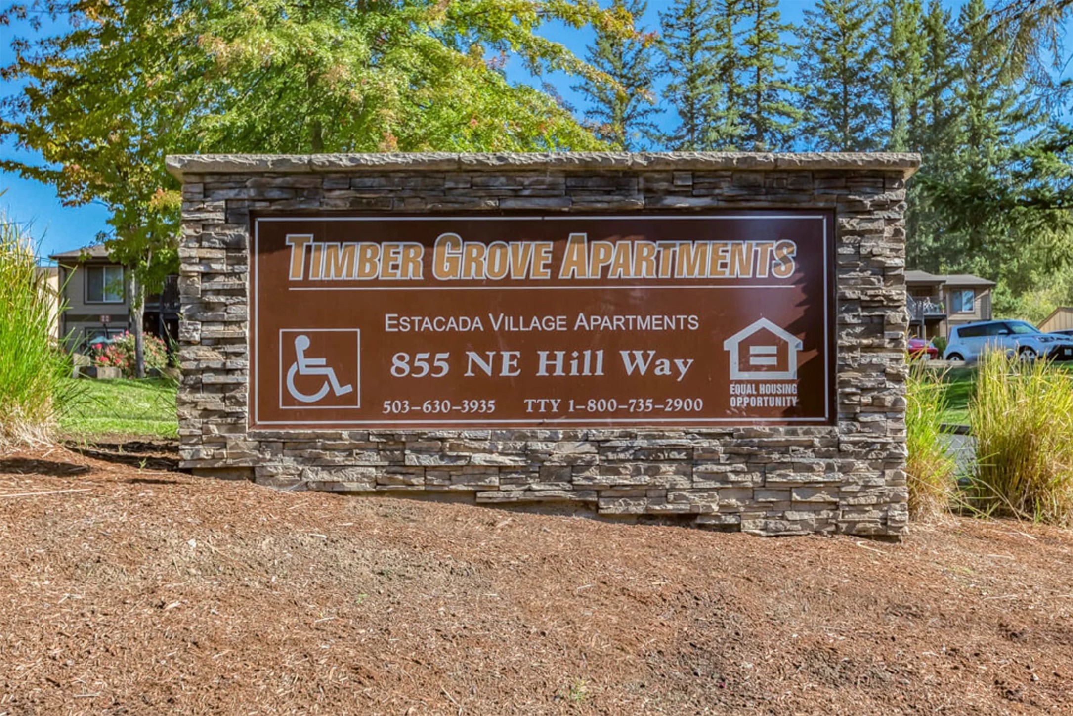 855 Northeast Hill Way Estacada, OR 97023 - Photo 2 of 10 a sign on the side of a building