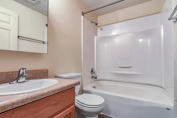 an empty room with closet area