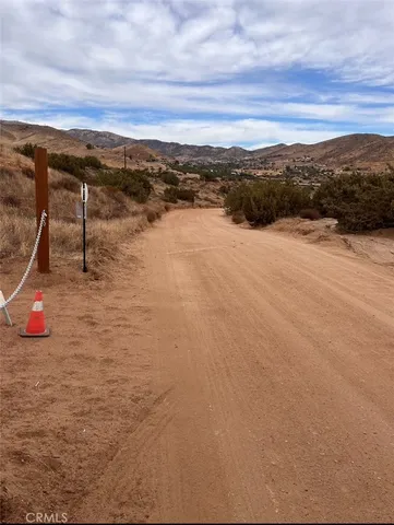 a view of a lake with sunset
