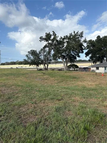 a view of a yard with an outdoor space