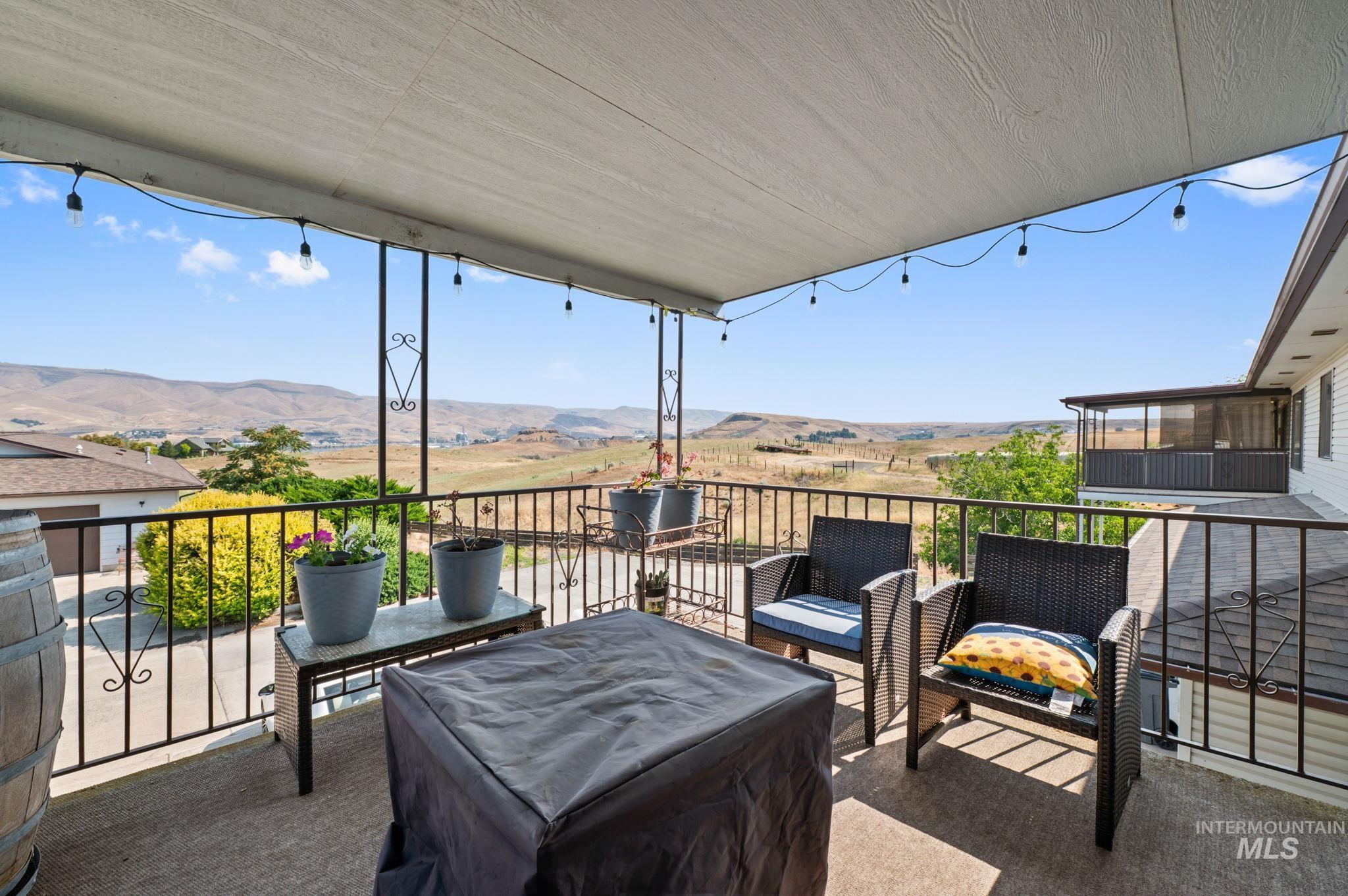 1443 29th Street Lewiston, ID 83501 - Photo 3 of 26 Patio / terrace featuring a mountain view