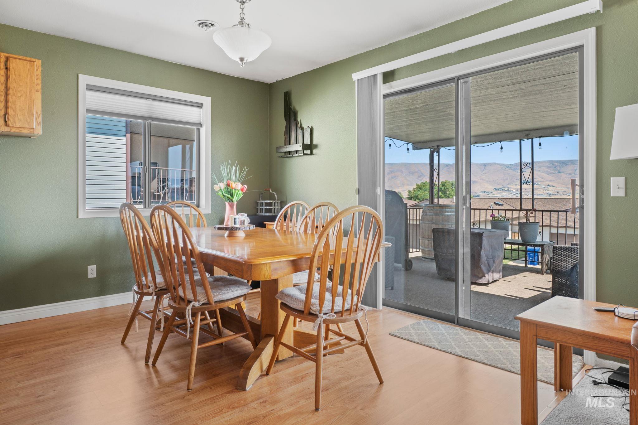 1443 29th Street Lewiston, ID 83501 - Photo 9 of 26 Dining space with light wood finished floors and baseboards