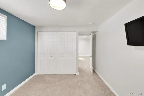 a view of hallway with natural light