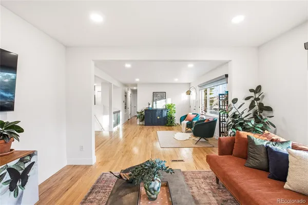 a living room with furniture and a couch