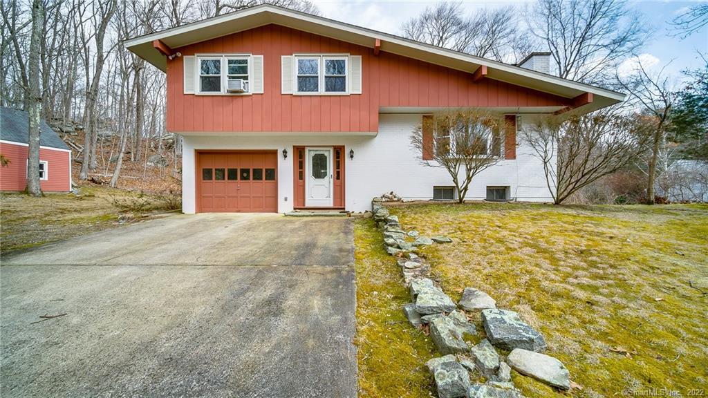 32 Valley Road Clinton, CT 06413 - Photo 1 of 1 a front view of a house with a yard
