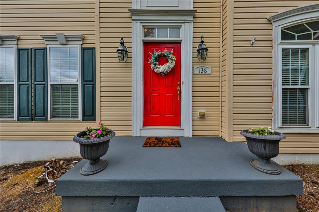 138 Clover Hollow Road Easton, PA 18045 - Photo 6 of 95 A vibrant red front door welcomes guests to this charming residence with inviting curb appeal.