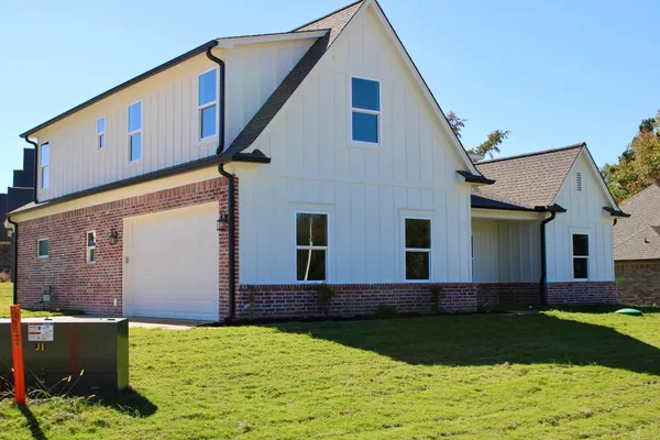 a view of a back yard of the house