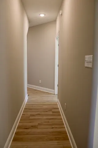 a kitchen with stainless steel appliances a sink stove and refrigerator