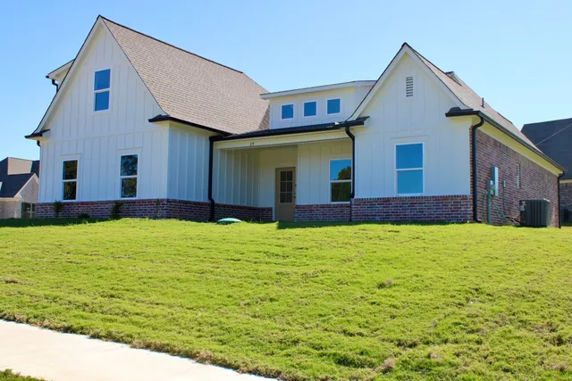 a house view with a garden space