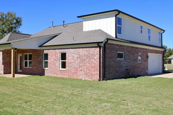 a front view of house with yard